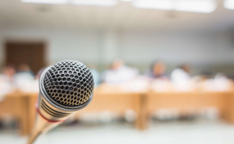 black-microphone-conference-room-filtered-image-processed-v-1-1